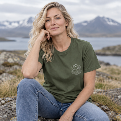 Woman in a military green Weathered Compass tee, front view with the GreyRider Threads left-chest logo