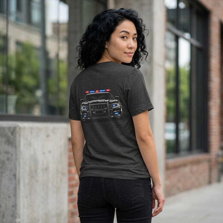 Woman wearing a dark grey heather Patrol Ready police t-shirt, back view with a police cruiser and red and blue lights