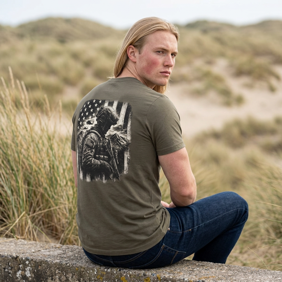 Man in an army green Military Service T-Shirt, back view with a soldier in tactical gear before a distressed flag